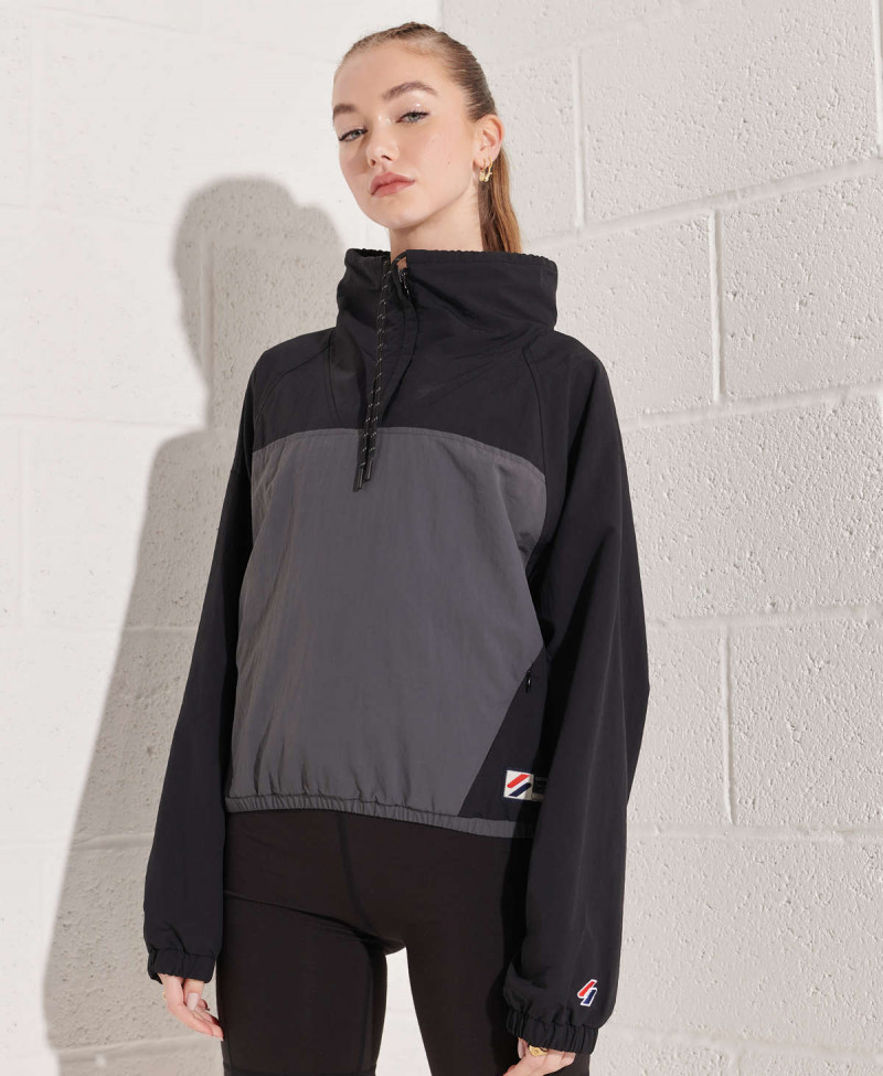 OVERHEAD CROPPED CAGOULE